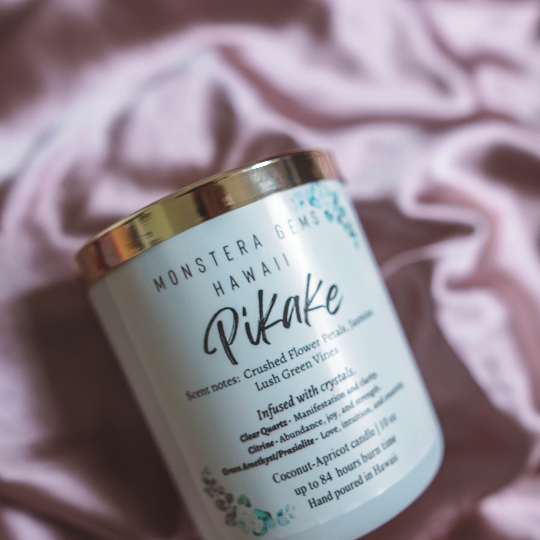 Handcrafted candles in glass jars with natural Hawaiian botanicals