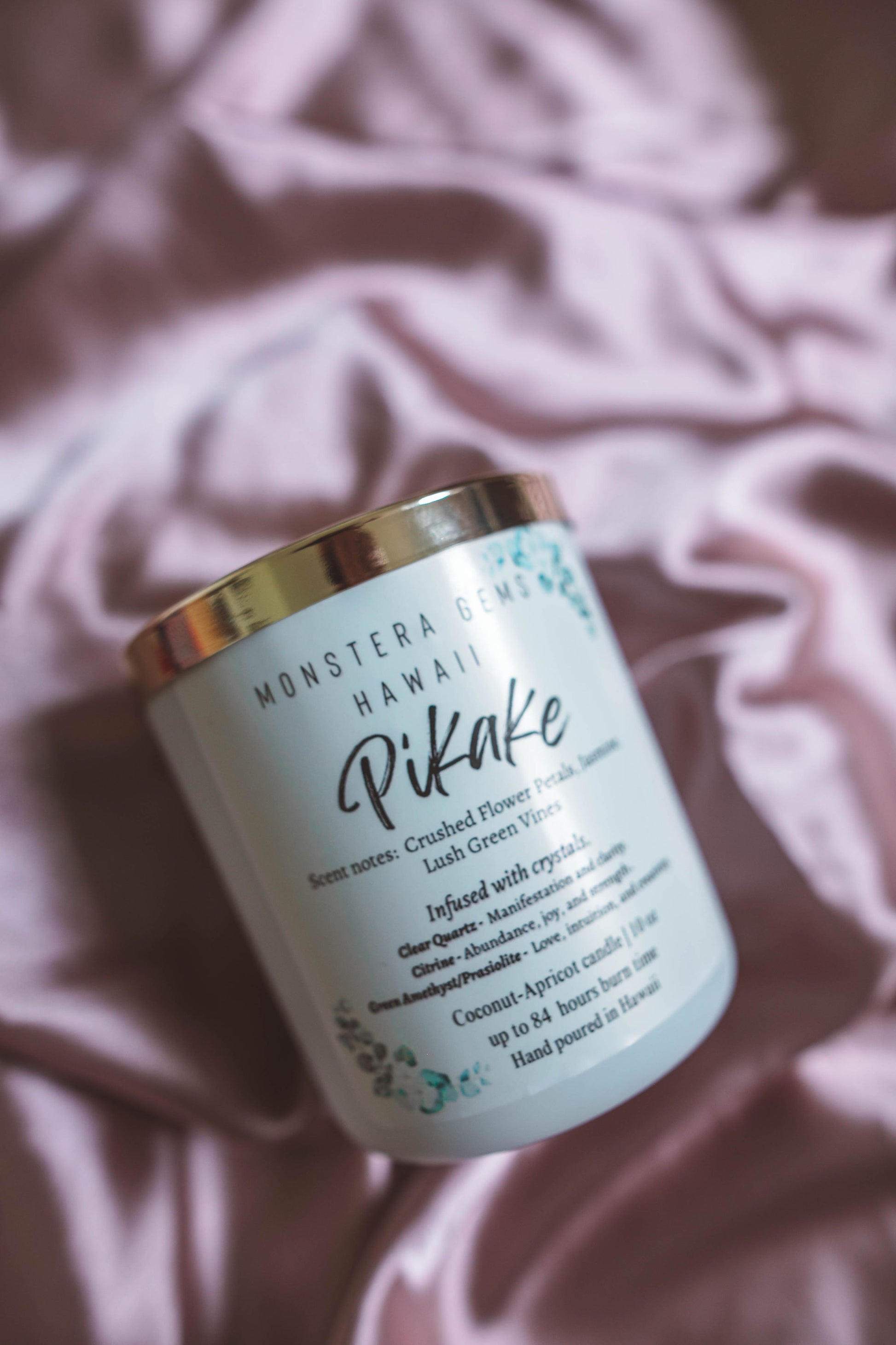 Handcrafted candles in glass jars with natural Hawaiian botanicals