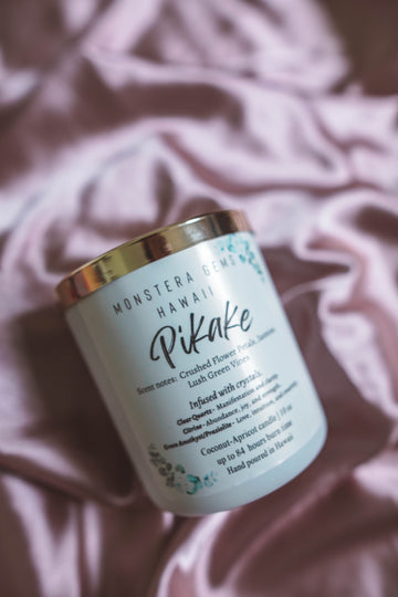 Handcrafted candles in glass jars with natural Hawaiian botanicals